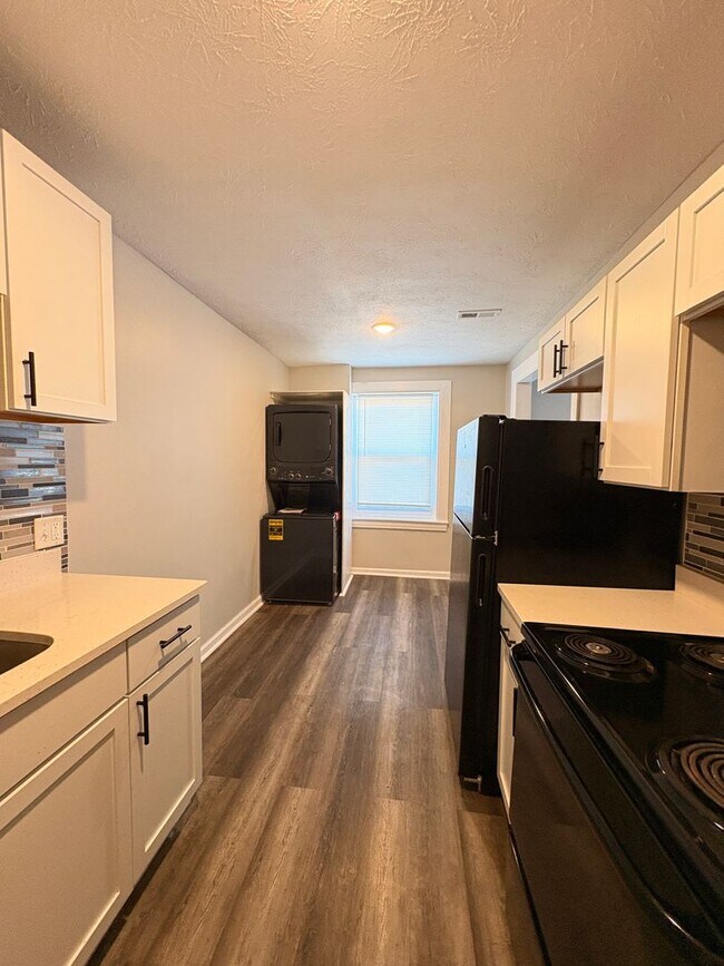 Building Photo - Live in Style without Breaking the Bank at Magnolias Living Apartments Washer & dryer in-unit