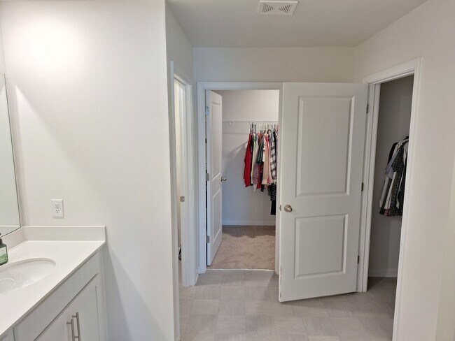 Building Photo - Lovely Four Bedroom Home  Appropriately 5 ...
