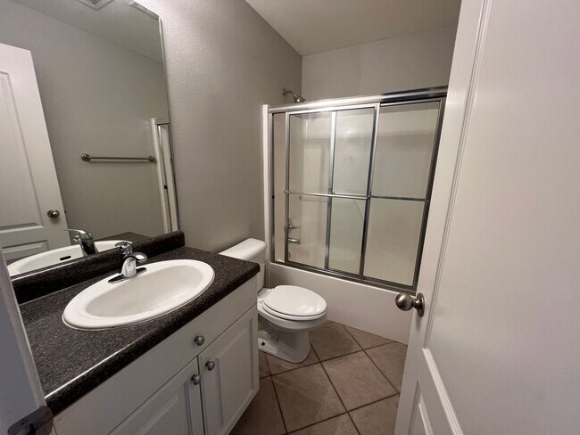 Building Photo - Three Bed / Three Bath with Fenced Yard and Community Pool