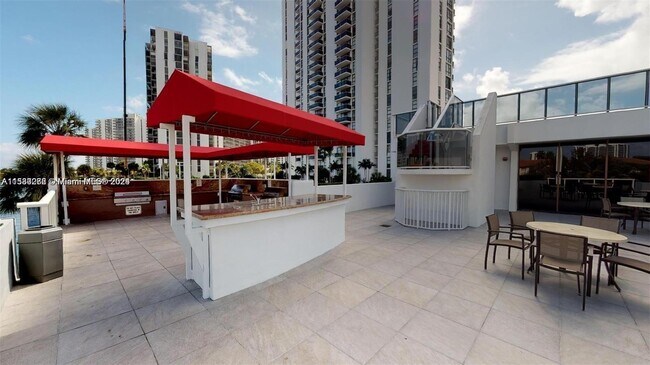 Building Photo - 3675 N Country Club Dr