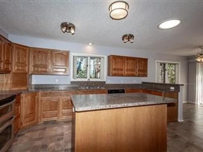 Building Photo - Large 3 Bedroom, 2 Bathroom home on the East End of the village. A serene neighborhood just waiti...