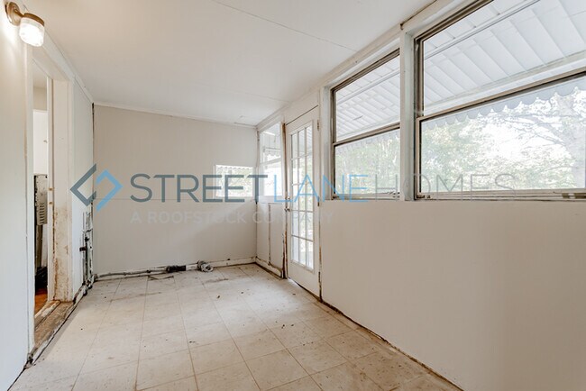 Building Photo - REDUCED! - NOW OFFERING HALF OFF FIRST FUL...
