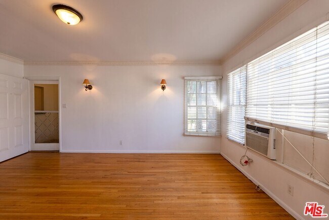 Building Photo - 8539 1/2 Cashio St