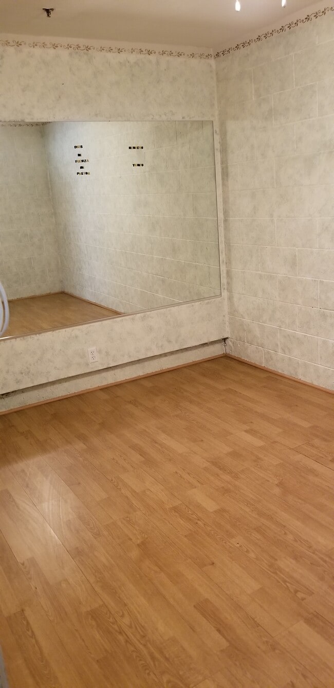 Bonus room off of garage. Dimensions are 9 feet x 14 feet (approximately 125 Square Feet) - 14365 Foothill Blvd