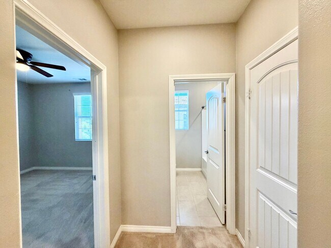 Building Photo - Move-In Ready 2 Bedroom 2.5 Bathroom Condo with LOFT & 2 Car Garage