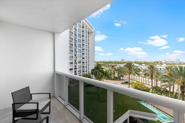 Building Photo - 10275 Collins Ave