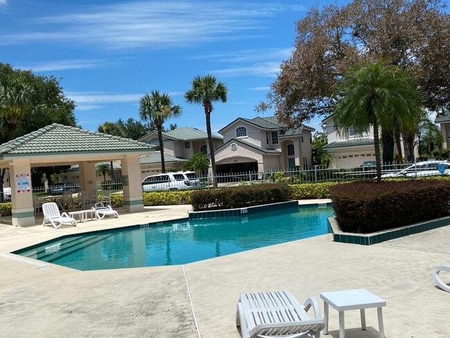 Building Photo - 3 Bedroom 2.5 Bath Cinnamon Bay Home with Stunning view, and Hardwood Flooring!