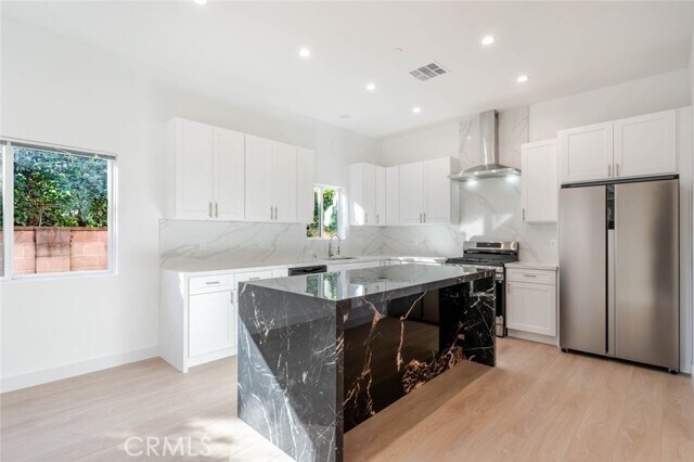 Building Photo - 6850 Ranchito Ave