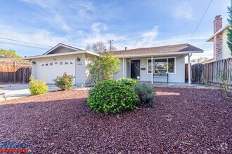 Building Photo - Lovely Home | Central A/C | Beautiful Yards