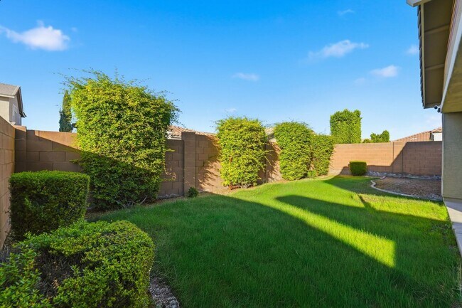 Building Photo - Stunning 4-Bed + Den Eastmark Home with Modern Upgrades Throughout