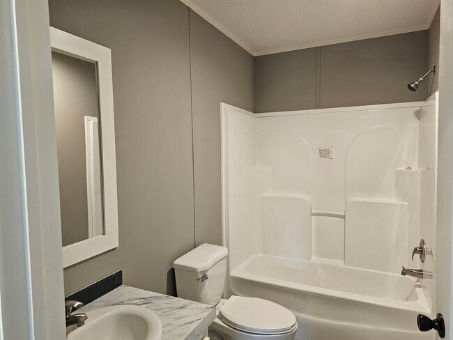 Building Photo - Welcome Home! Spacious 3-Bed, 2-Bath Split Floor Plan on ¾ Acre Lot