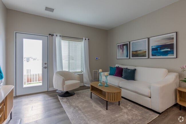 2BR, 1BA - 867SF - Living Room - Stonefield of Clinton 55+ Senior Living