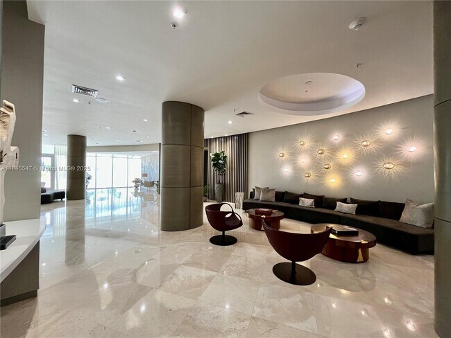 Building Photo - 10275 Collins Ave