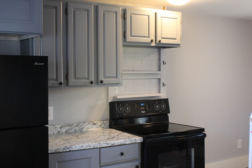 Lots of cabinet space. New counters &amp; flooring. - 1011 Main St
