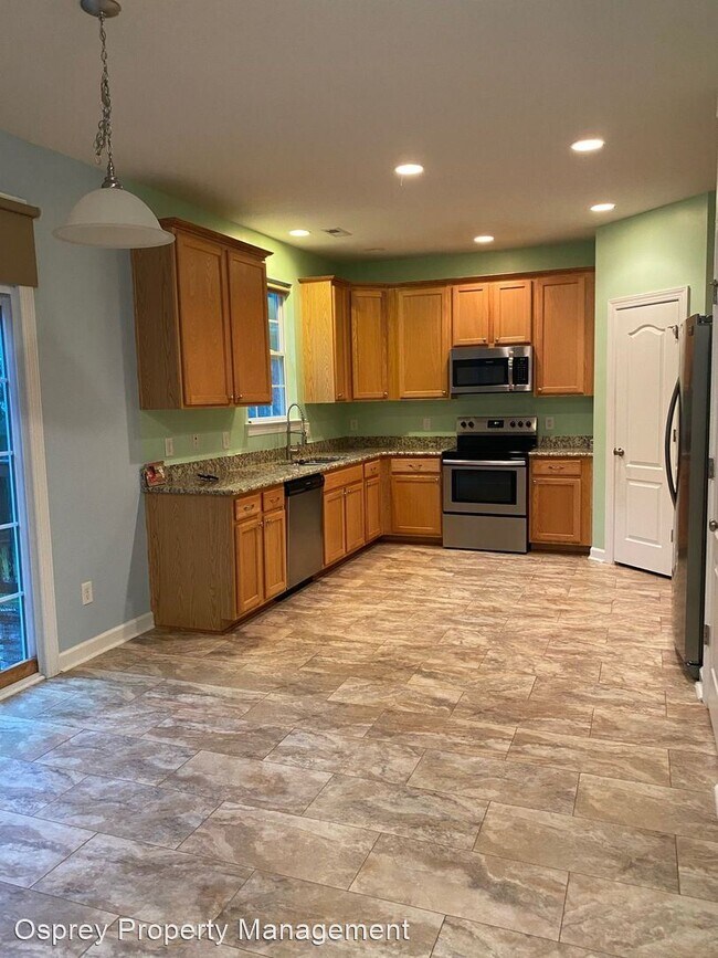 Building Photo - 4 br, 2.5 bath House - 5400 Ann Arbor Lane