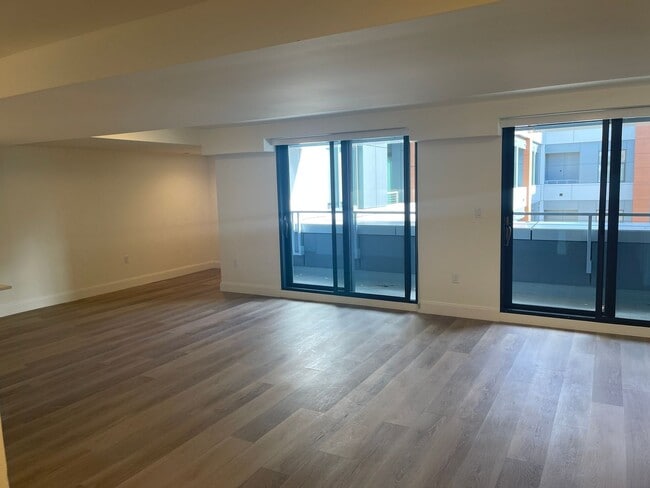 Building Photo - LUXURY 2 BED 2.5 BATH DUPLEX, All New , Laundry in Unit Garage Pool,. NO fee