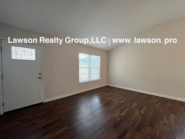 Building Photo - Adorable and Updated-One Level Living with Paved Driveway