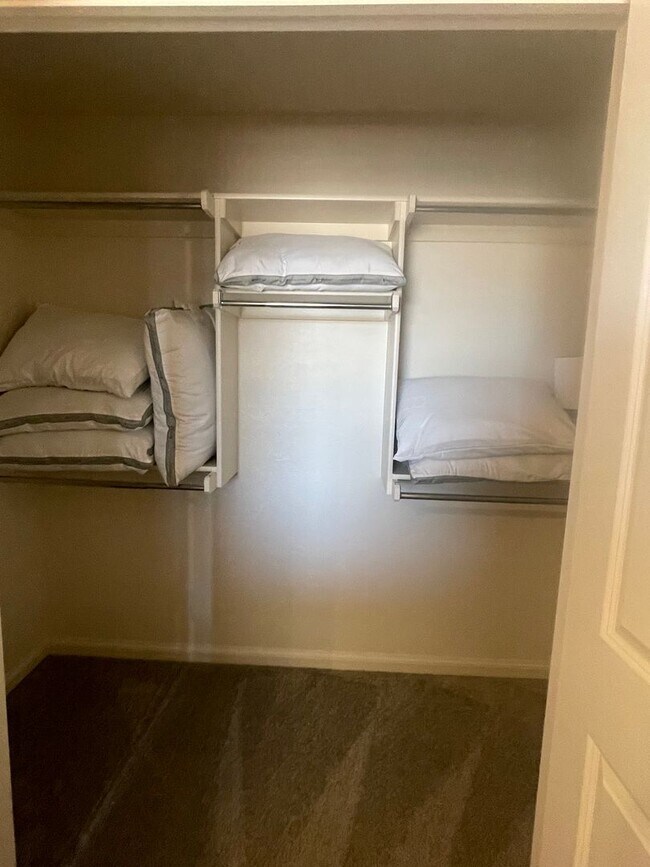 Building Photo - *Fully Furnished* 4 bedroom, 2.5 bathroom, 2 car garage Gated Neighborhood