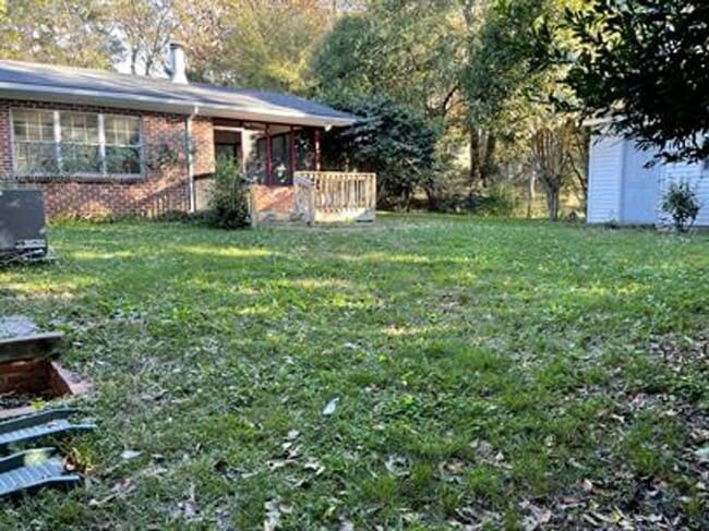 Building Photo - 2 Living Spaces and Carport