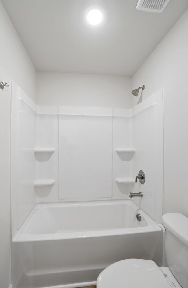 Building Photo - 4BR Home in The Pines at Paw Creek – New Construction + Private Deck