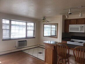 Building Photo - ONE MONTH FREE on this cat-friendly 1 BD o...