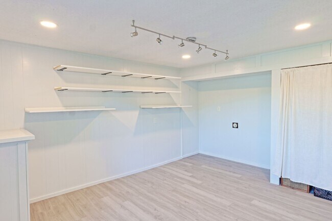 Building Photo - Spacious 3-Bedroom Attached Villa with Finished Basement & Private Fenced Yard!