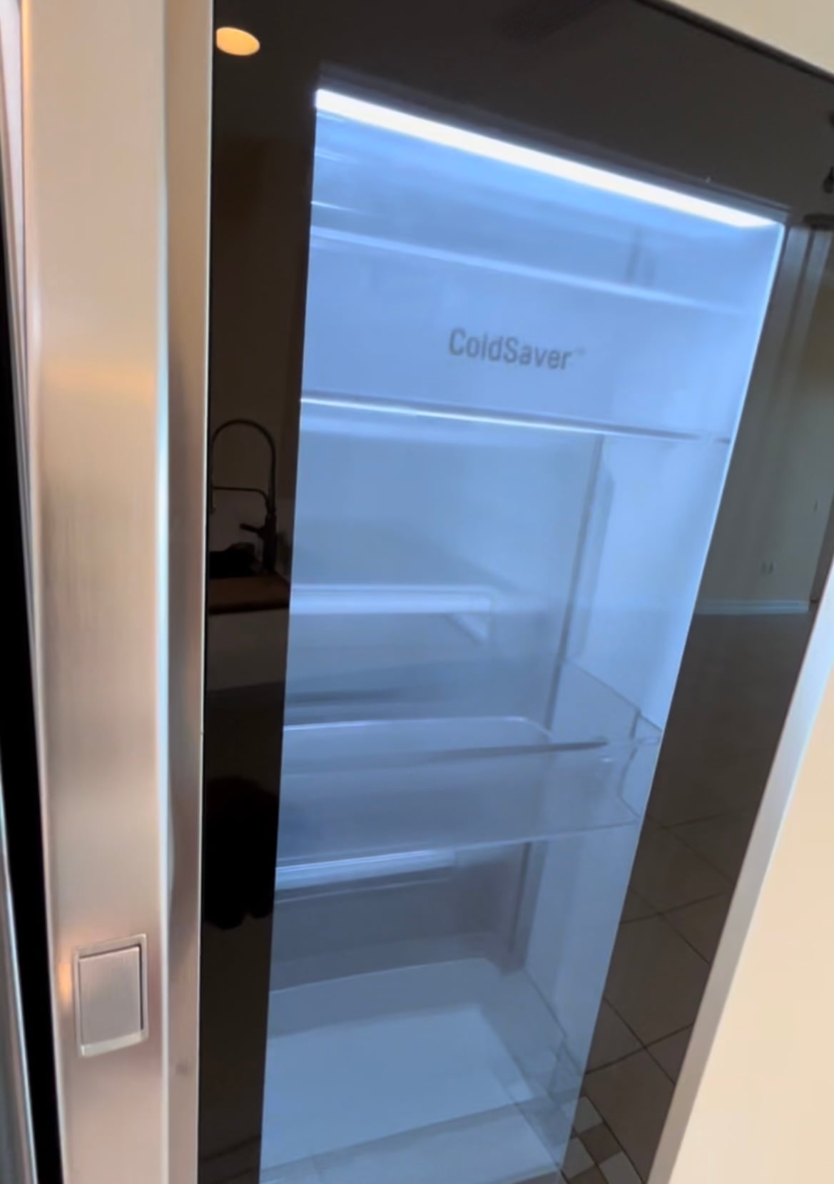 "Knock to see inside," LG refrigerator - 2743 1st St
