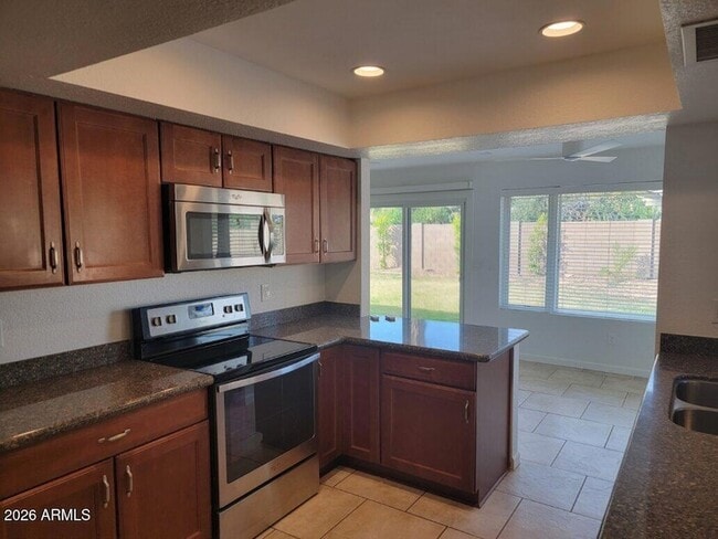 Building Photo - 4428 E Joan De Arc Ave