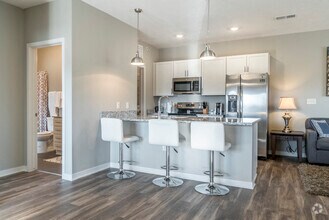 Modern kitchens offer stainless steel appliances and plenty of counter space for all your cooking needs.