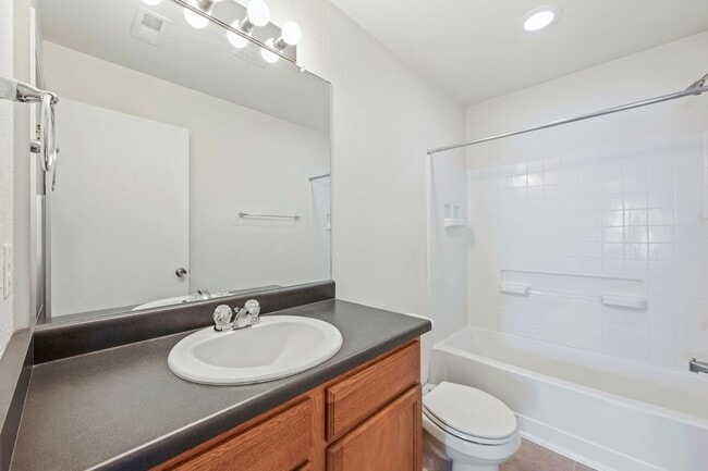 Building Photo - Bright & Spacious 4BR Tri-Level Home w/ Backyard + 2-Car Garage | Pool Access Included!