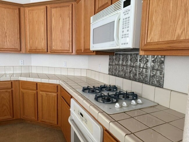 Building Photo - Beautiful 3 bed home with 3 car garage in Indian Hills behind Target