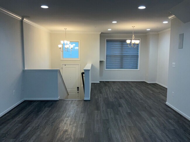 Building Photo - Beautiful 4BR 3.5BA 3 level townhome with 2 car attached garage located in the Cabin Branch Commu...