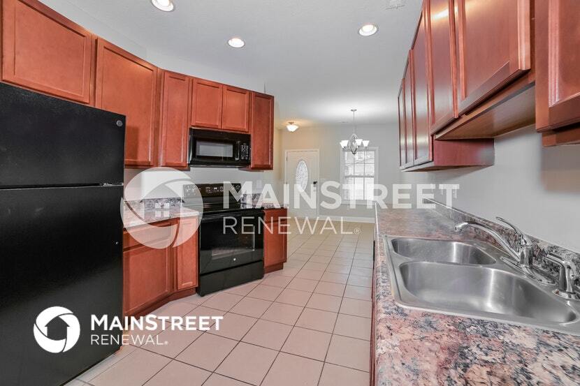 Building Photo - 7012 Edon Hall Way