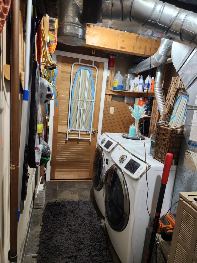 Laundry Room with European style washer and dryer and deep freezer - 3411 Lindenwood Dr