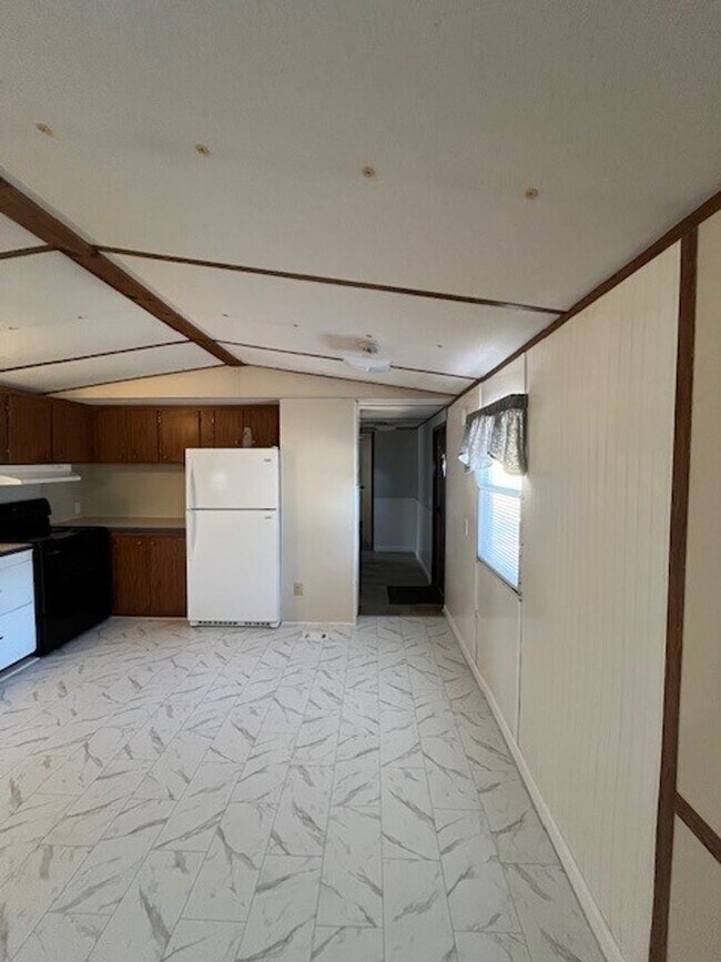 Building Photo - Welcome to this charming 2-bedroom, 1.5-bathroom home located in the desirable area of Leland, NC