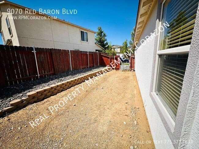 Building Photo - 9070 Red Baron Blvd