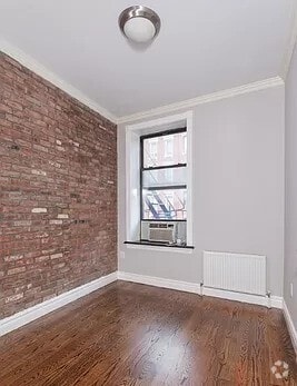 Building Photo - 47 1/2 E 1st St
