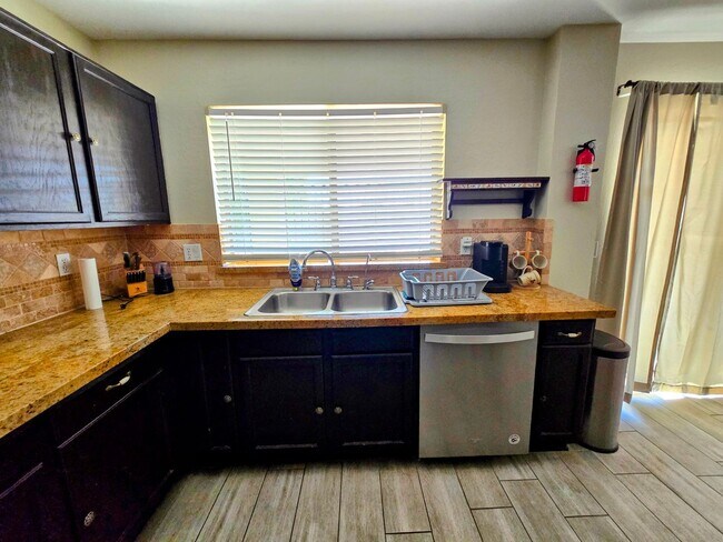 Building Photo - STUNNING 4 Bed, 2.5 Bath Oasis with Pool Your Dream Home Awaits!