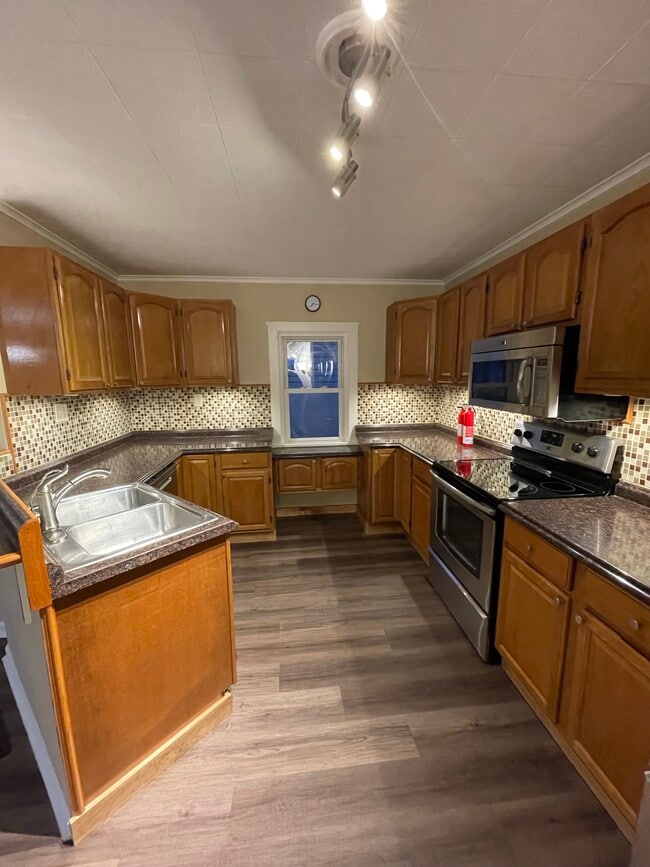 kitchen with fridge, oven, microwave, and dishwasher - 2310 Old Berwick Rd