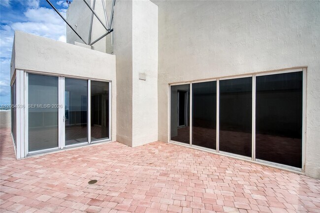 Building Photo - 19111 Collins Ave