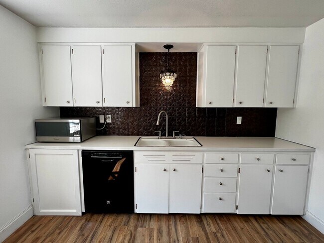 Building Photo - Non-Refundable & Security Deposit Total: $2000.00