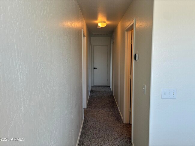 Building Photo - 7287 S Sunrise Way