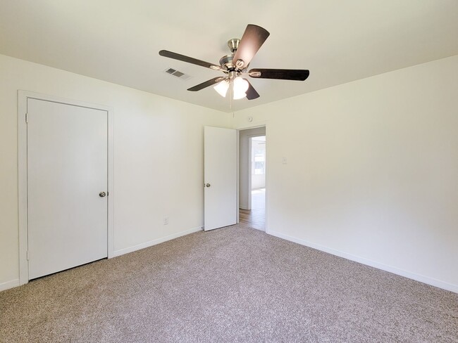 Building Photo - REMODELED 4 BEDROOM 2 BATH LEASE HOME IN A...