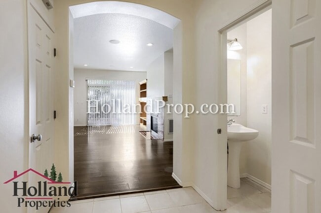 Building Photo - Charming 3-Bedroom Home with Wood Floors, Gas Fireplace & Private Patio