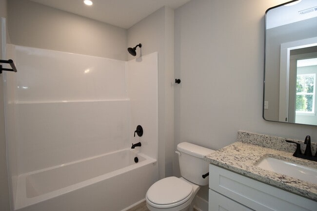 Building Photo - Pick Your Neighbors! Brand-New 3 Bed, 3 Ba...