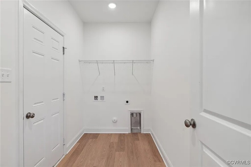 First Floor Laundry/Mudroom off Garage and Kitchen - 236 Amburn Ln