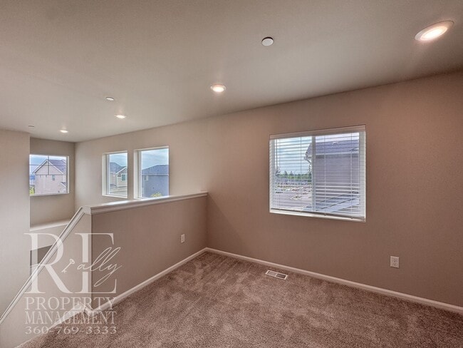 Building Photo - Warm & Inviting 4-Bedroom Home with Vaulted Ceilings, Loft, Fireplace & Fenced Backyard