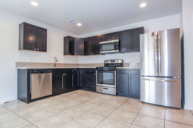 Building Photo - Three Bedroom Duplex