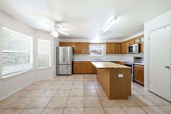 Building Photo - 4 Bedroom home with ZERO carpet close to RAFB