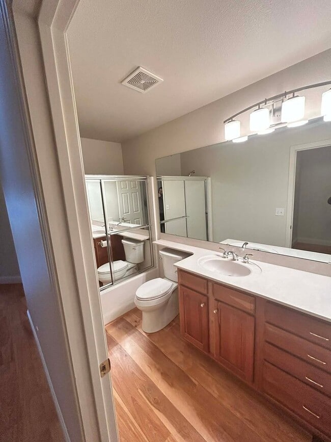 Building Photo - Spacious Duplex with 3-Car Garage & Private Patio!